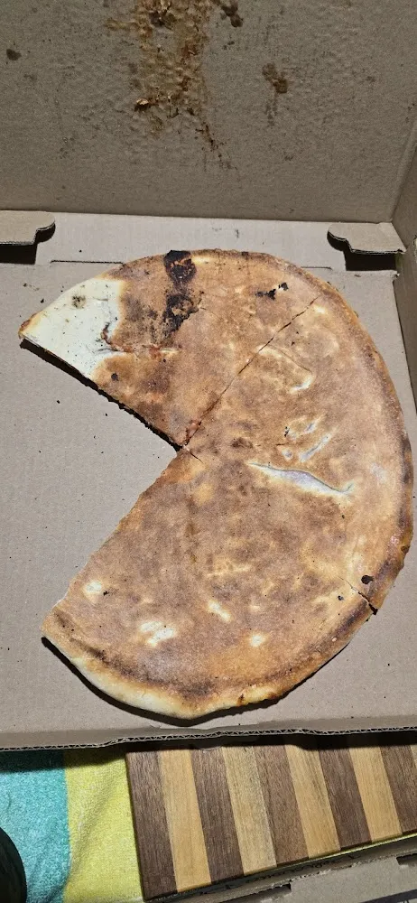 Light Crust Pizza Hawaiian on the Other Side